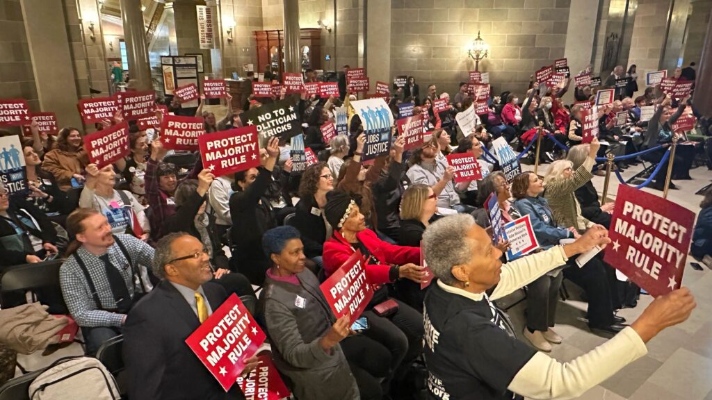 Missourians hold signs in support of Protecting Majority Rule 